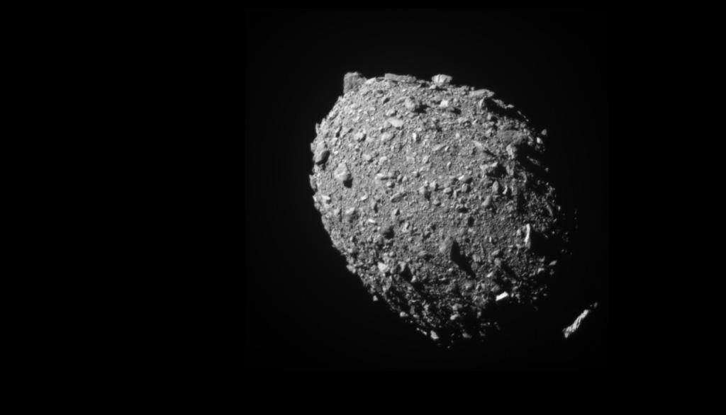 An asteroid is seen before a collision