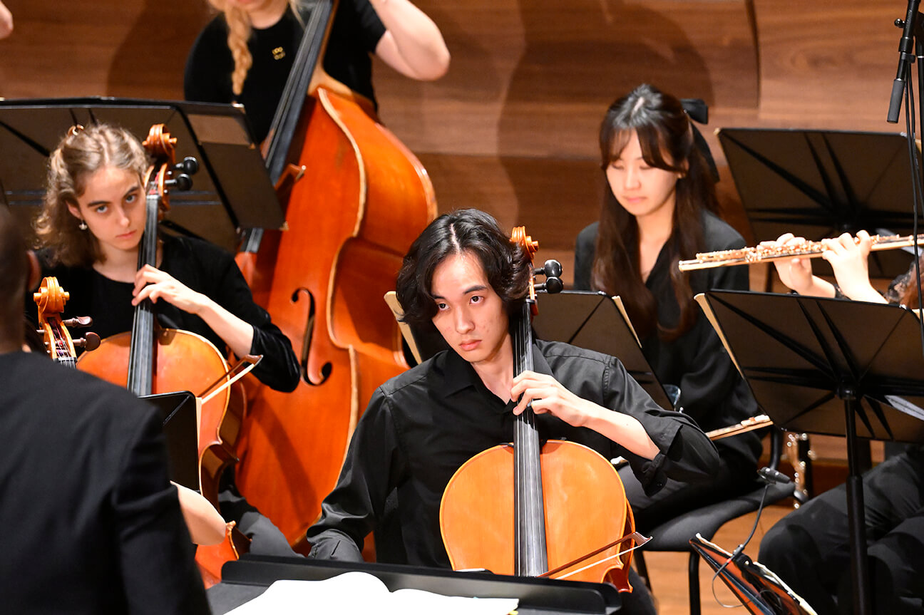 musicians playing instruments at a concert