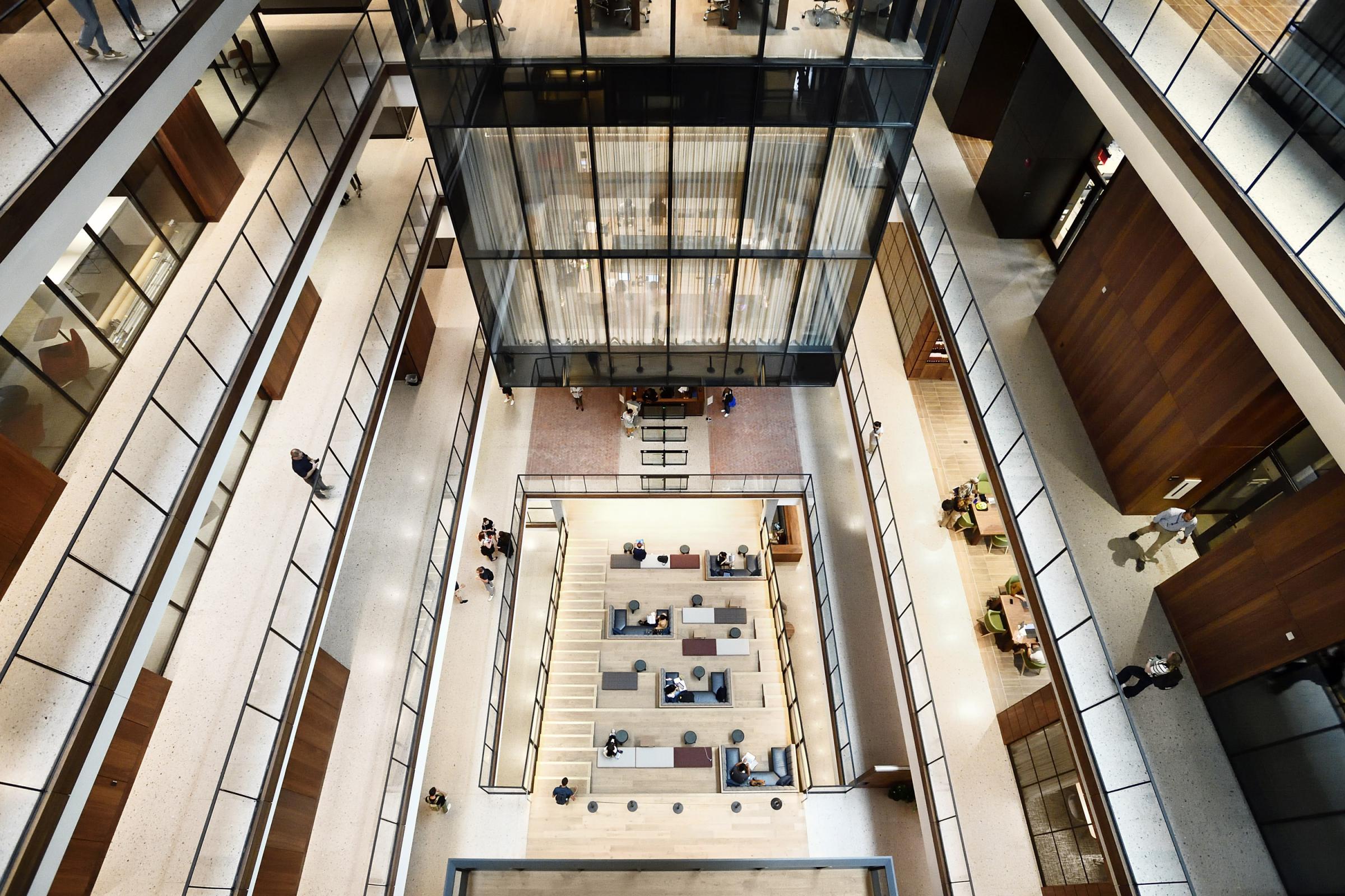 An overhead view of a multitiered lobby space